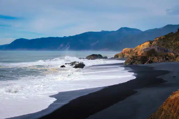 Forget Hawaii – California Has A Hidden Black Sand Beach That’s Way Less Crowded